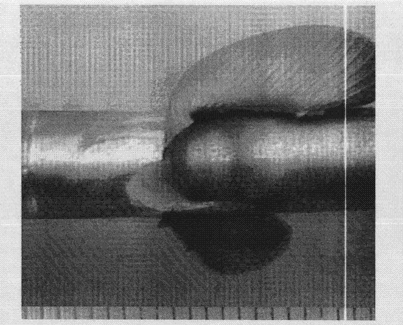 Current-carrying inertial axial friction composite welding method and equipment thereof