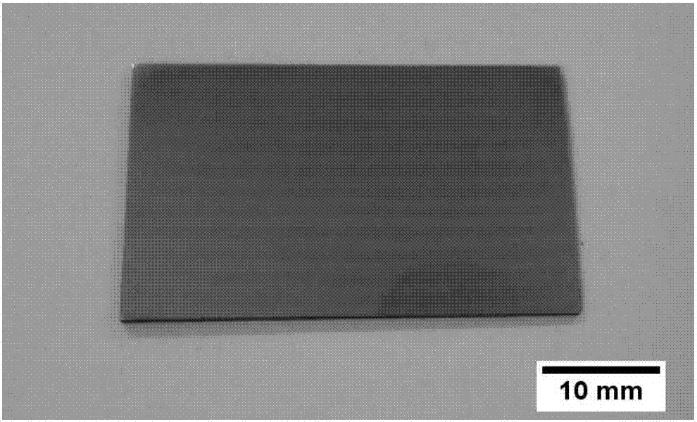 Method for preparing layered titanium-based composite material based on powder laying - hot pressing sintering