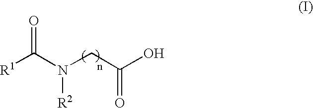 Compounds containing amide and carboxyl groups as asphaltene dispersants in crude oil