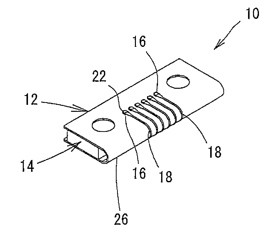 Connector and pushing jig