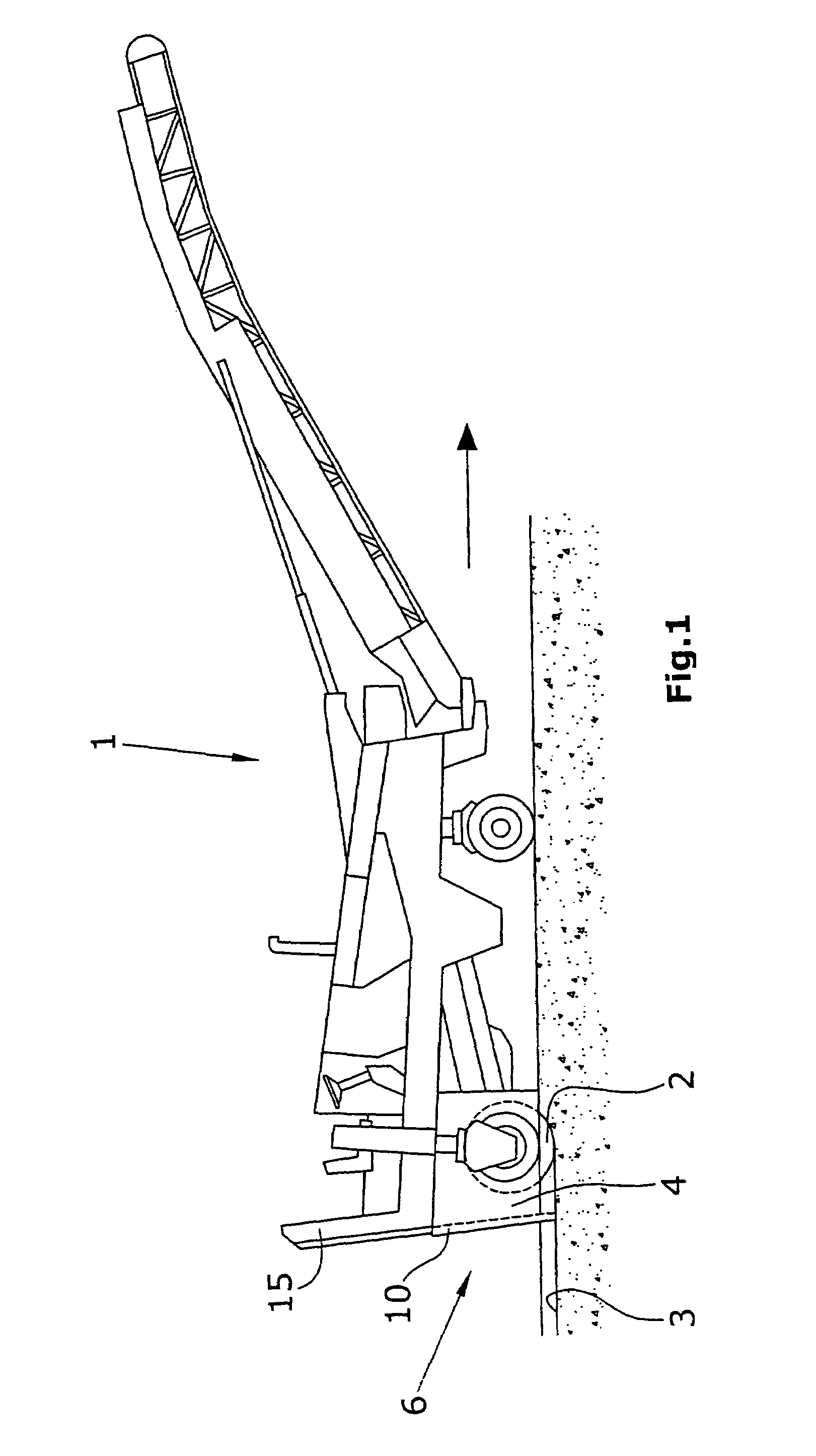 Scraper device for milling drums of a construction machine