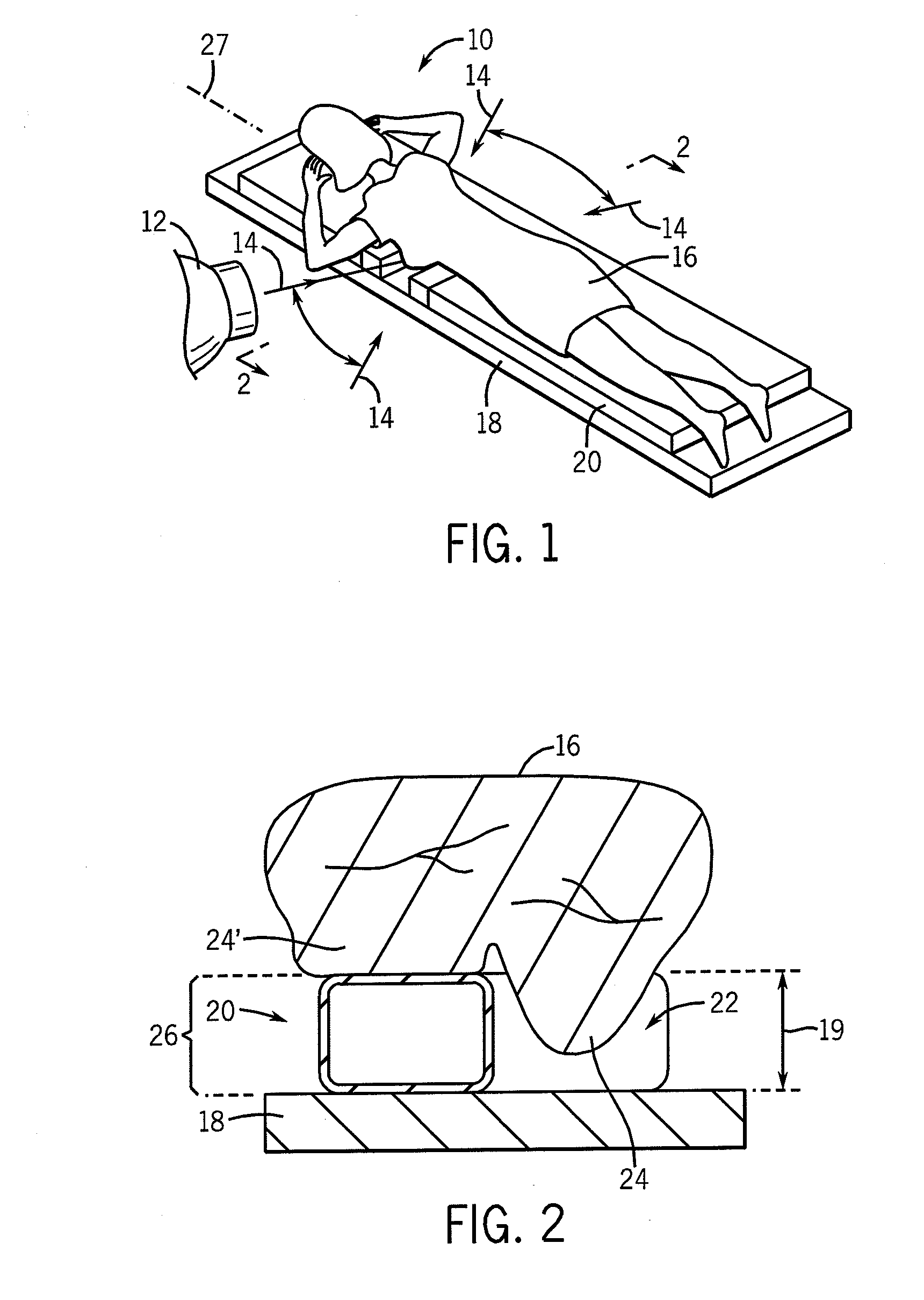 Low skin dose patient positioning device for radiation treatment of prone breast