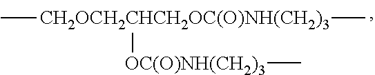 Optical device surface treatment process and smudge-resistant article produced thereby