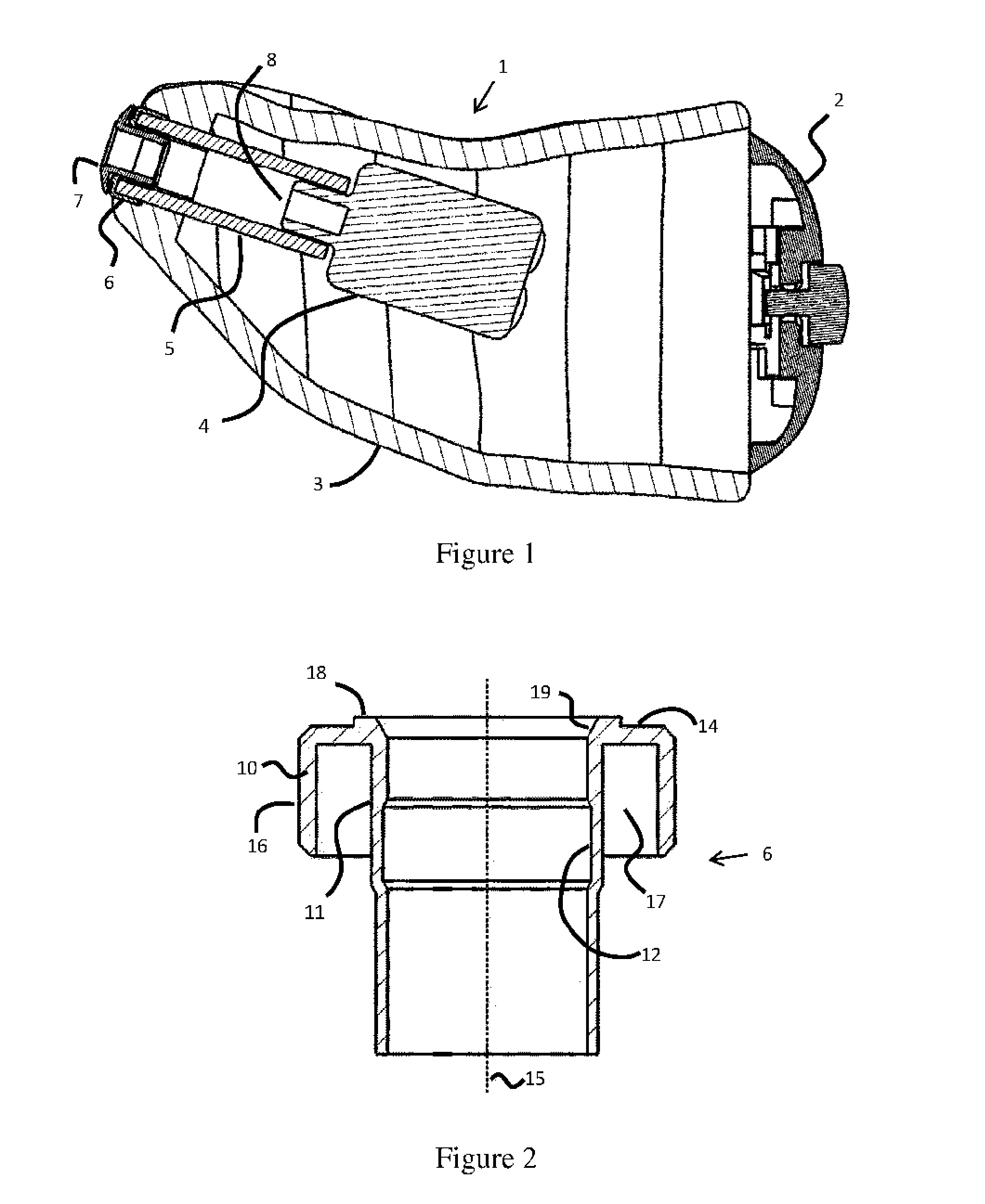 Hearing aid with a bushing for an ear wax guard