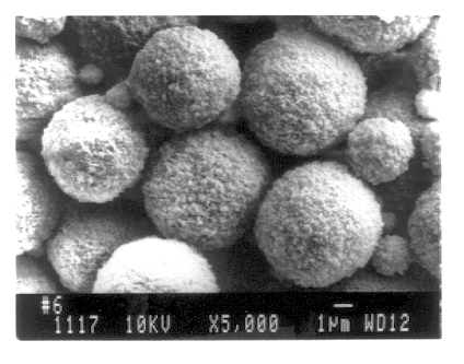 Micro-serrated particles for use in color toner and method of making same