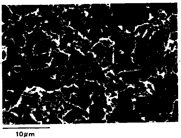 Surface-treated steel sheet on which particulate tin is deposited and resin-coated steel sheet