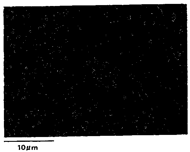 Surface-treated steel sheet on which particulate tin is deposited and resin-coated steel sheet