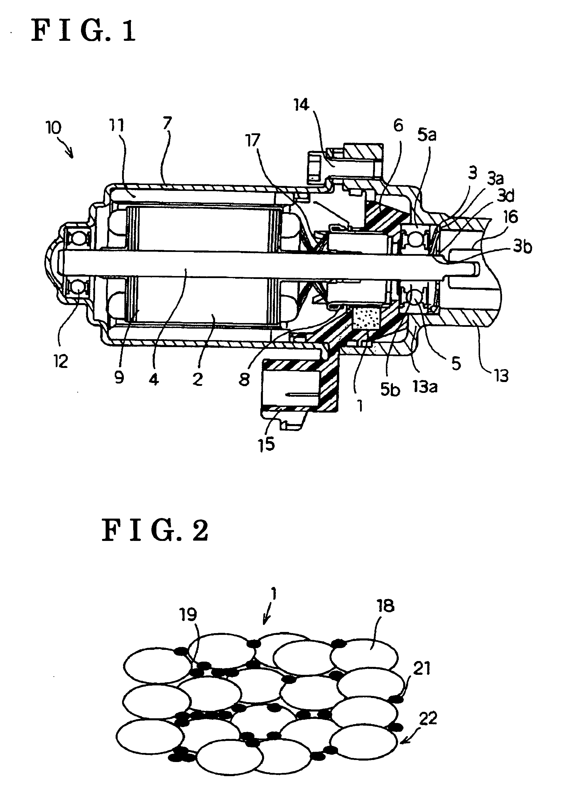 Metal-graphite brush and motor including a metal-graphite brush