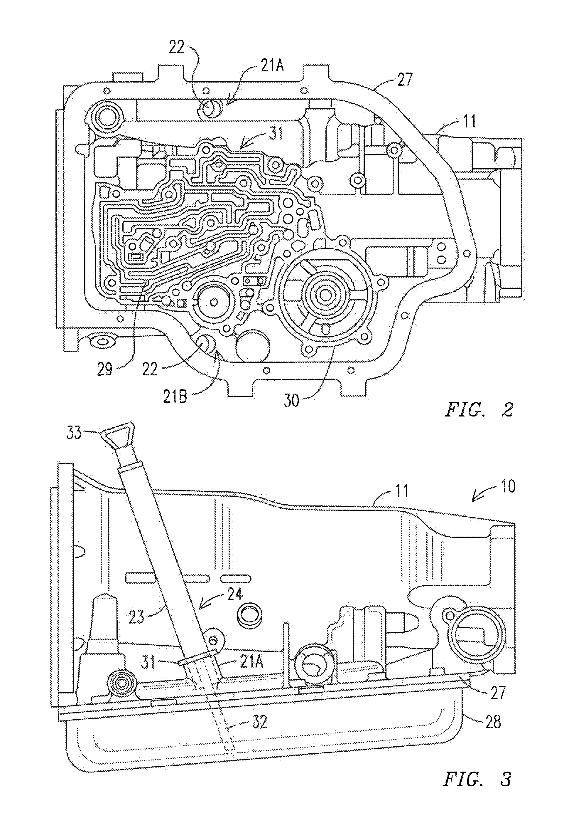 Transmission and transmission housing with multiple dipsticks and dipstick apertures, circumferentially positioned internal lugs and an adjacent fluid inlet port