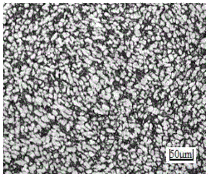 Forging machining method of large-sized bar materials of TC4 (Ti-6Al-4V) titanium alloy