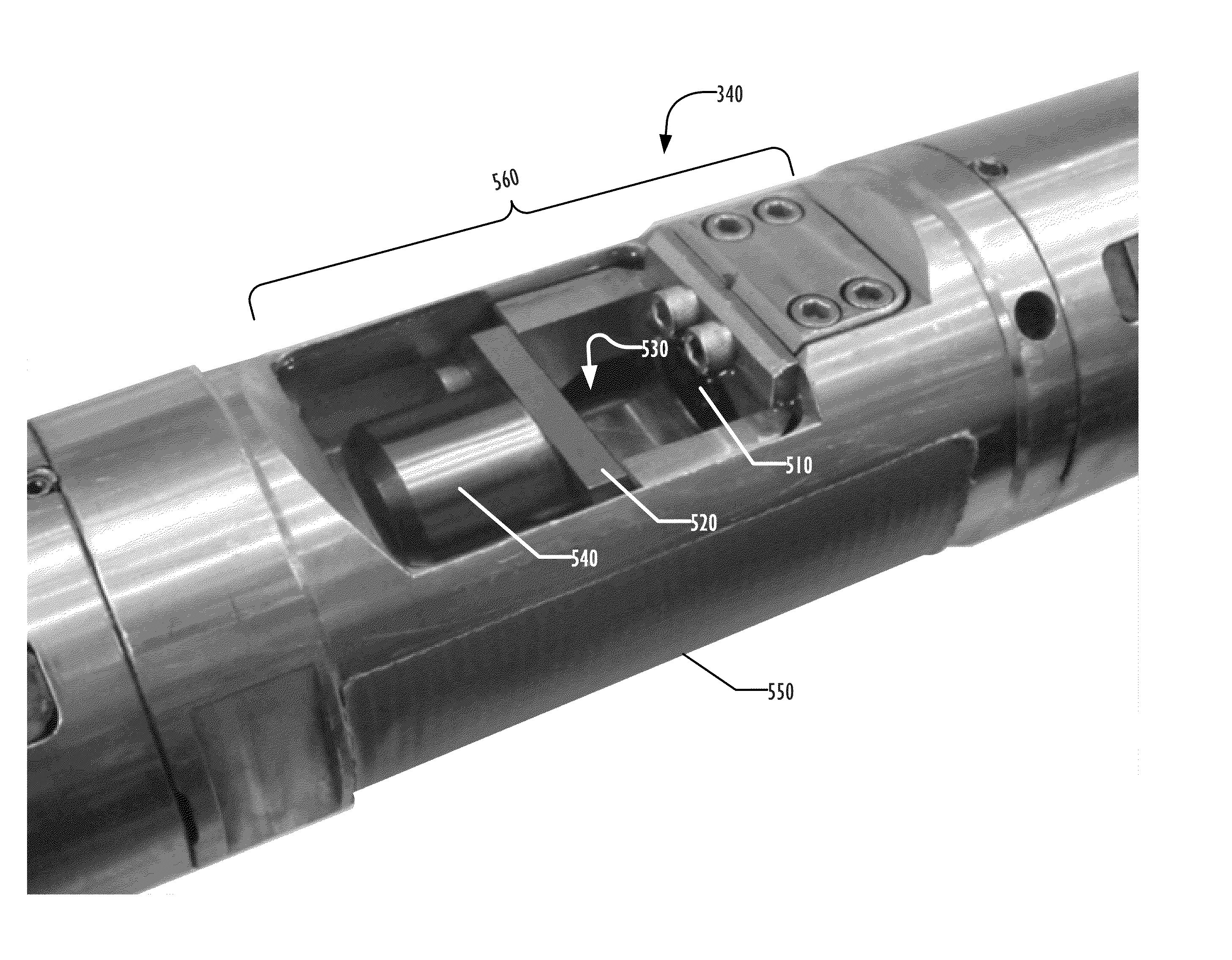 Apparatus and method for measuring the acoustic impedance of wellbore fluids