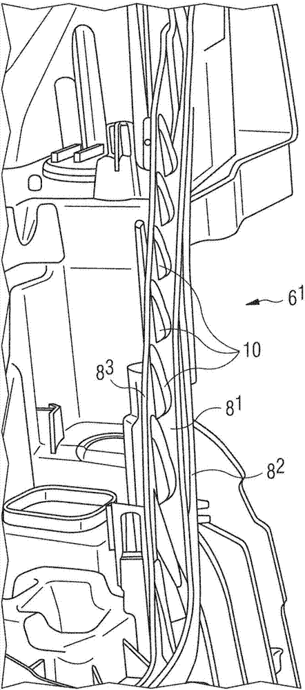 Joint between housing and headlamp outer lens with glue-retaining ribs