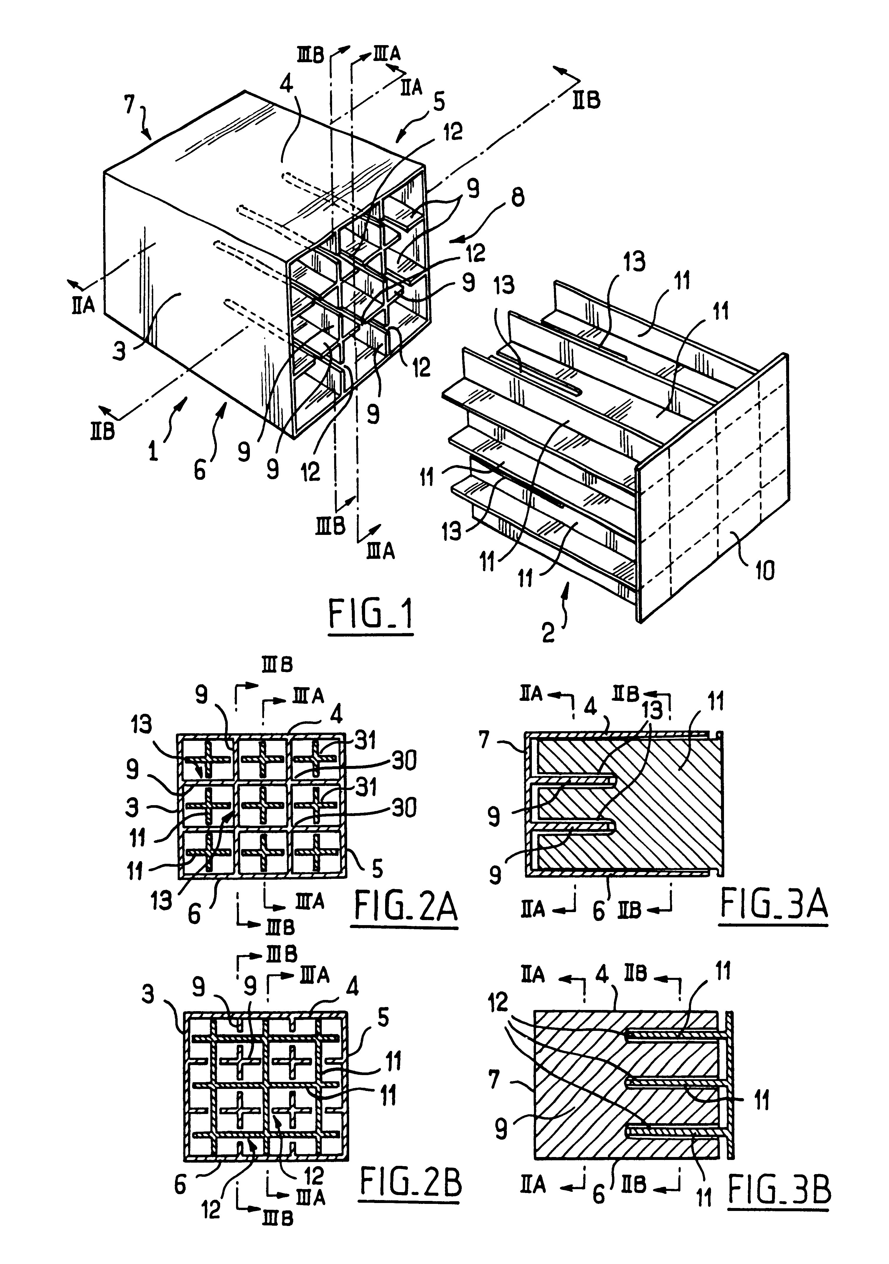 Partitioned impact absorber made of two interfitting blocks, and a bumper beam including such an impact absorber