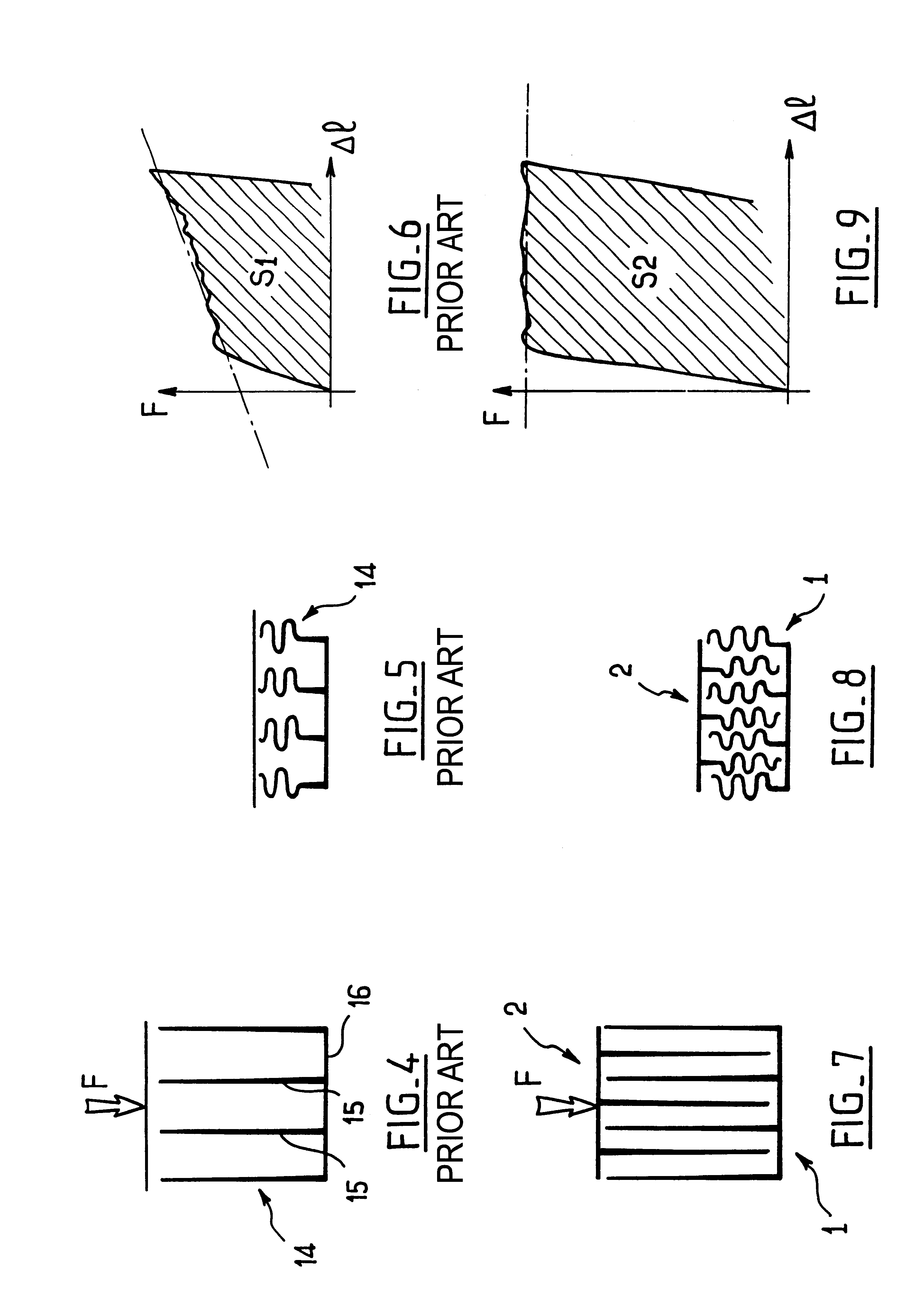 Partitioned impact absorber made of two interfitting blocks, and a bumper beam including such an impact absorber