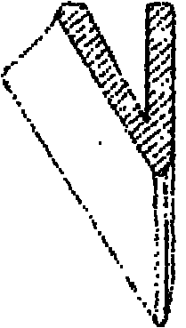 Rake tooth with sharp ridge and curved surface