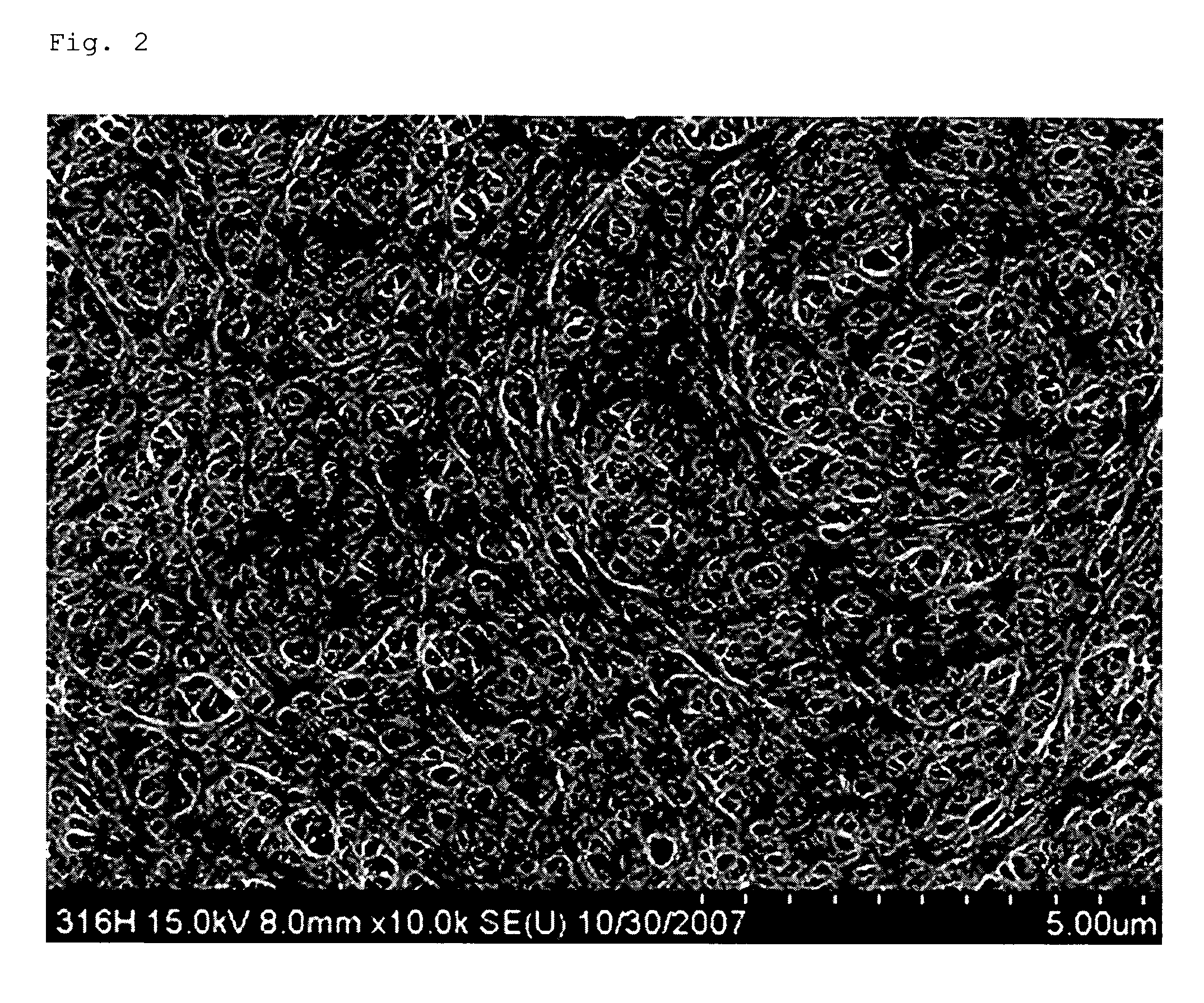 Microporous polyolefin composite film with a thermally stable porous layer at high temperature