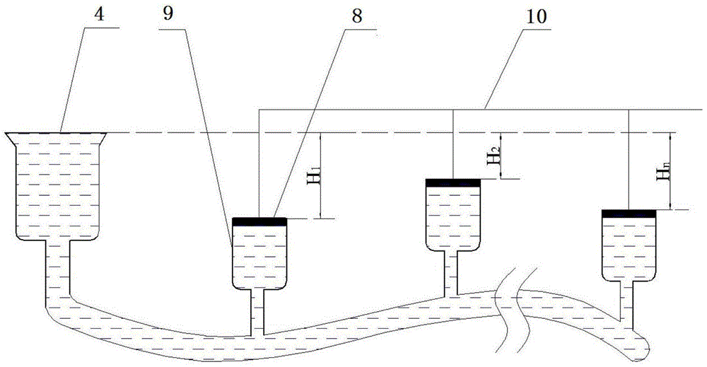 Remote and real-time ground surface settlement monitoring system based on connected vessel principle