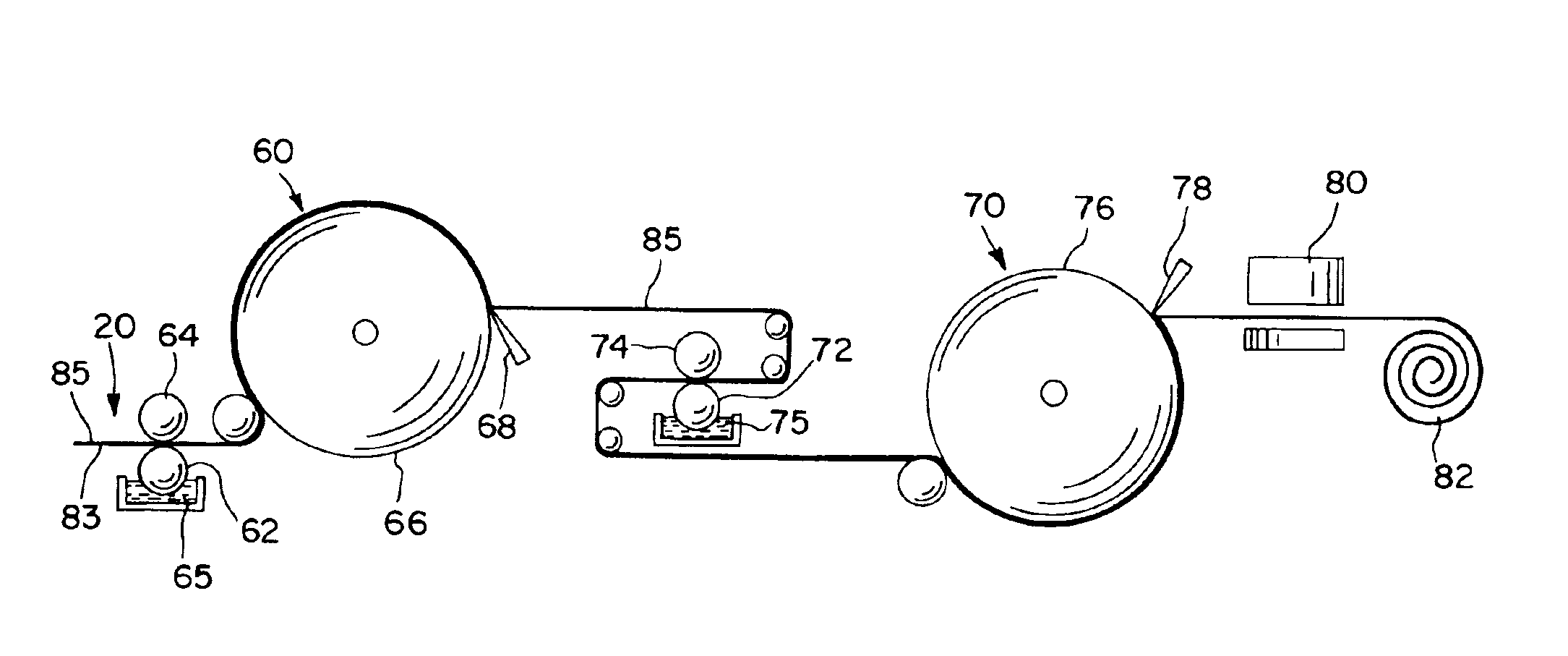 Entangled fabrics containing staple fibers