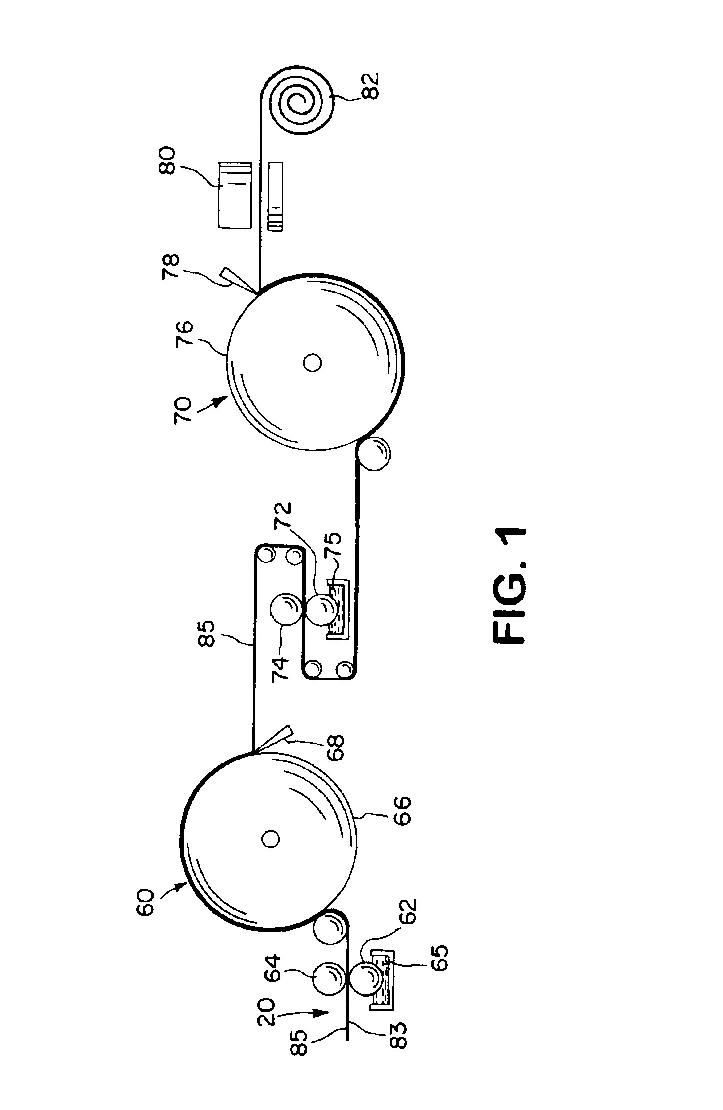 Entangled fabrics containing staple fibers