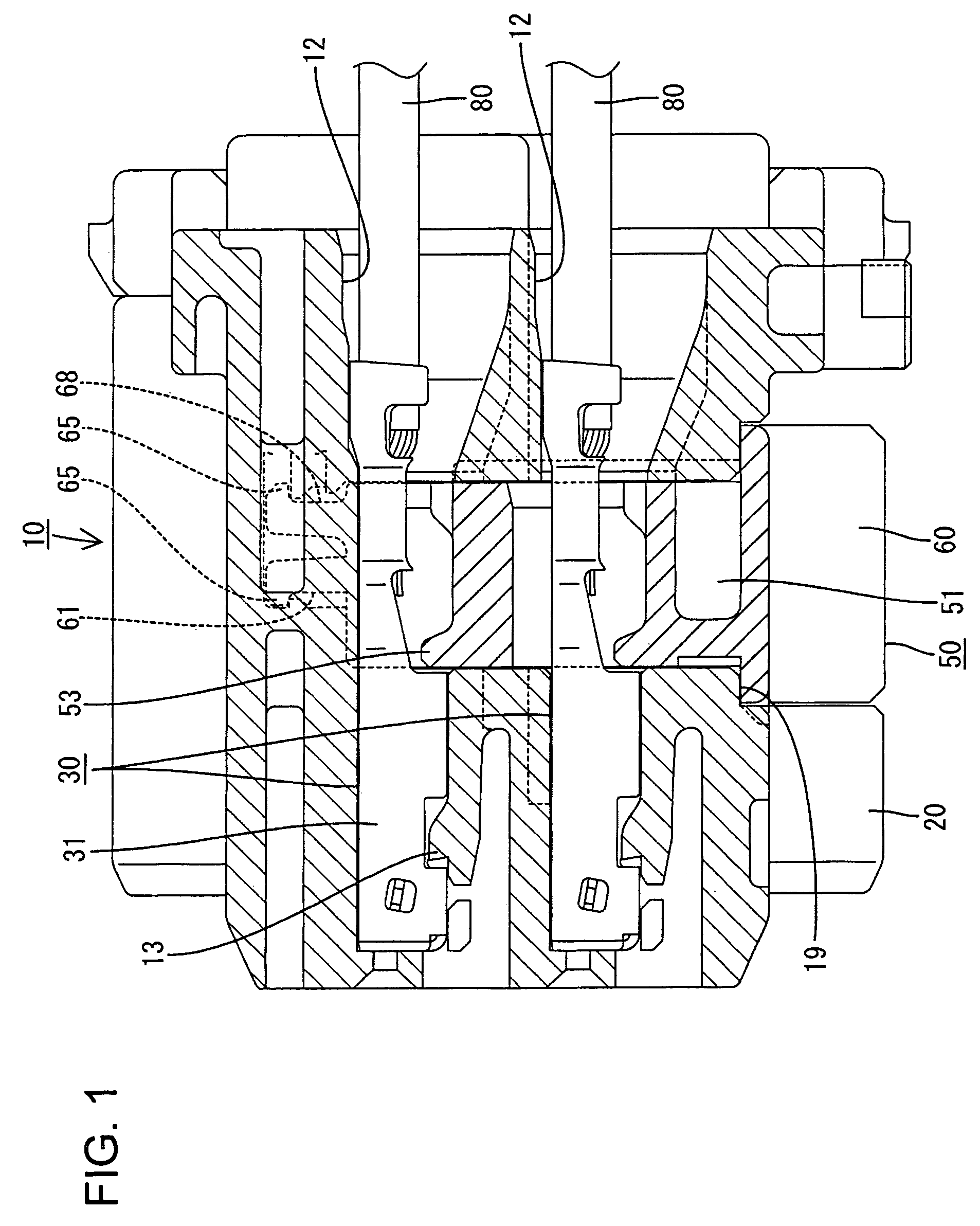 Electrical connector with a terminal retainer with an intermediate lock