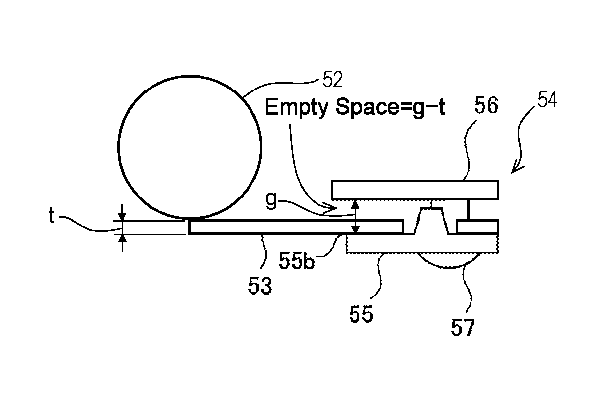 Cleaning apparatus with scraping member, and image forming apparatus including the same