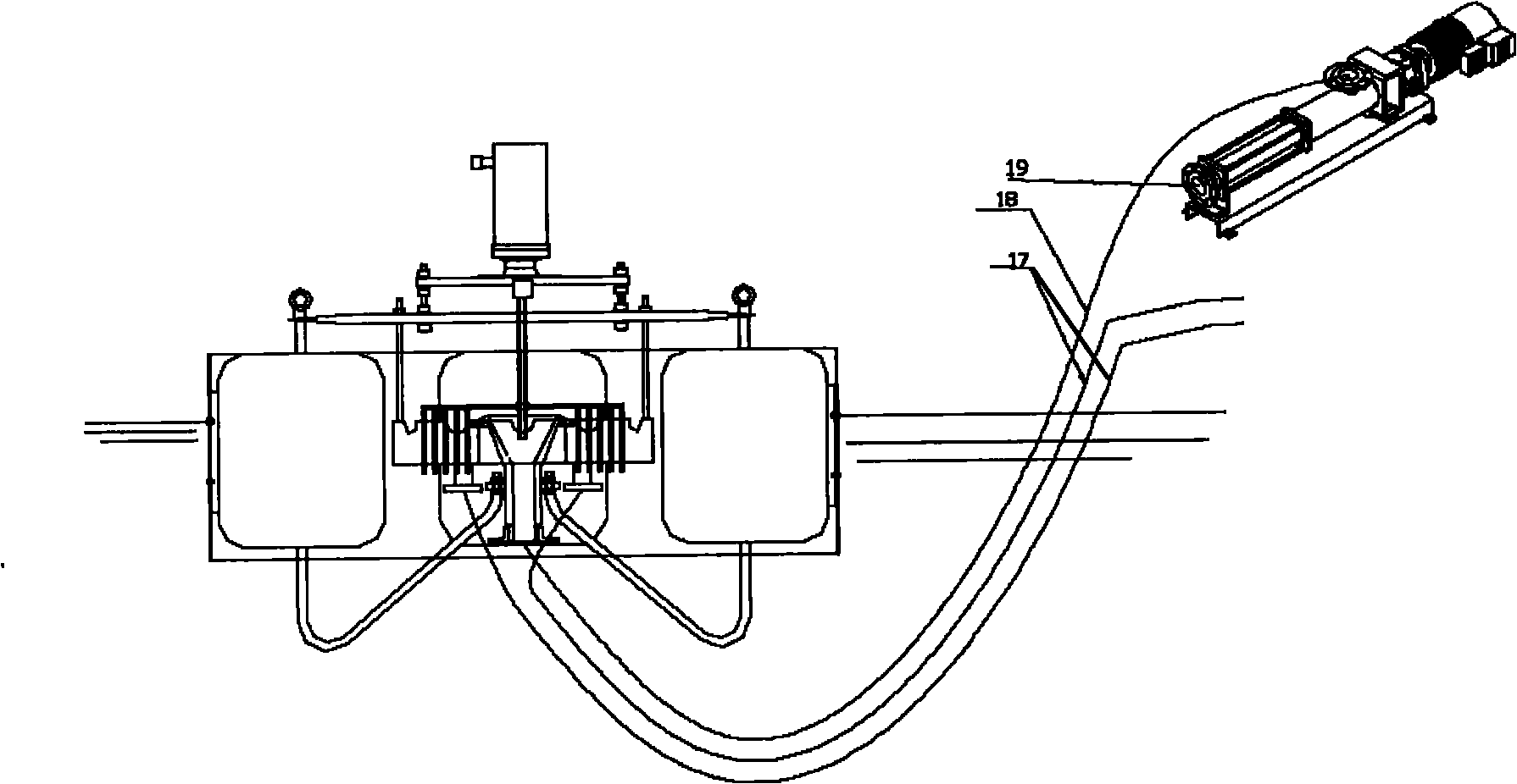 Oil slick recovery device