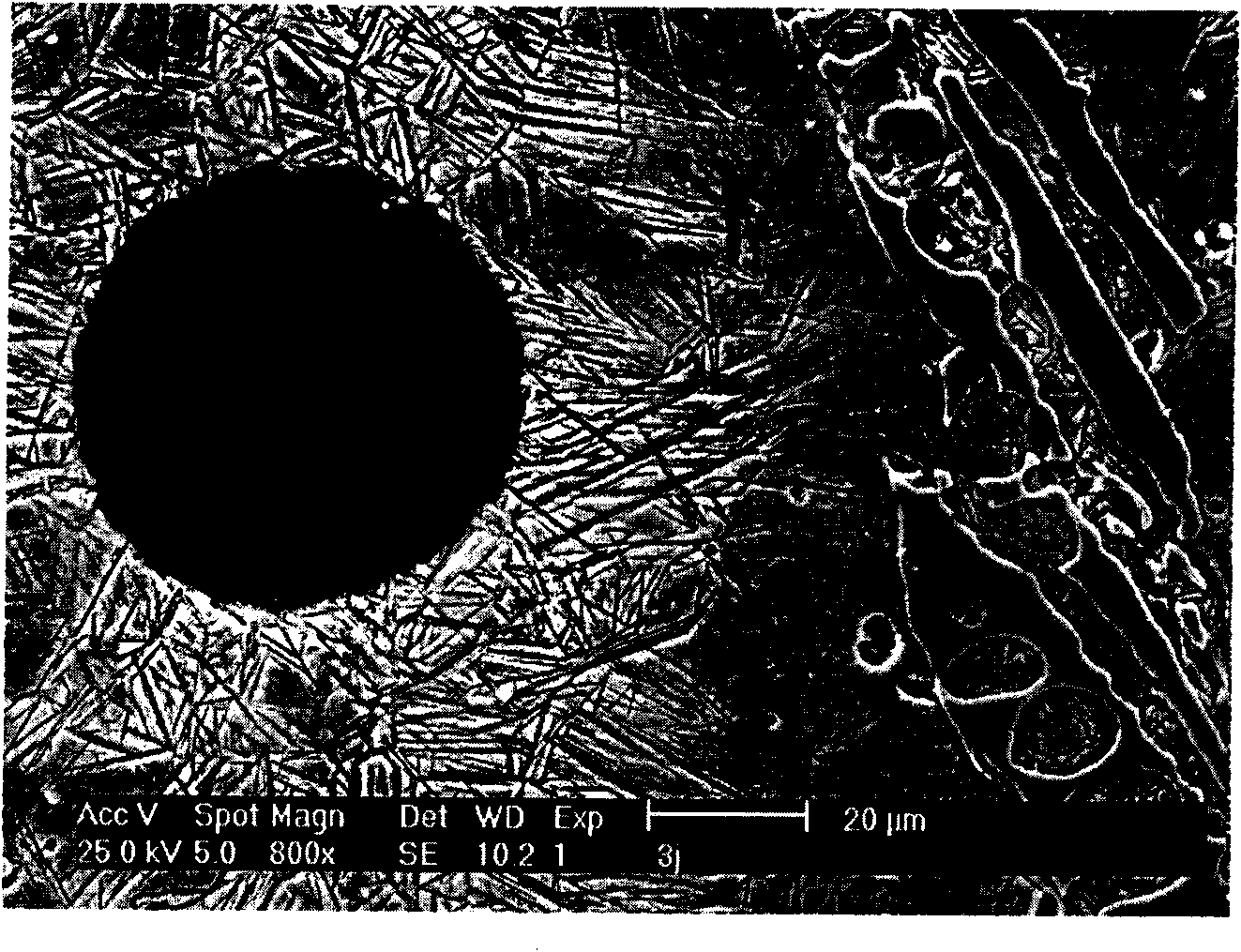 Carbide-containing ausferrite spheroidal graphite cast iron grinding ball and manufacturing method thereof