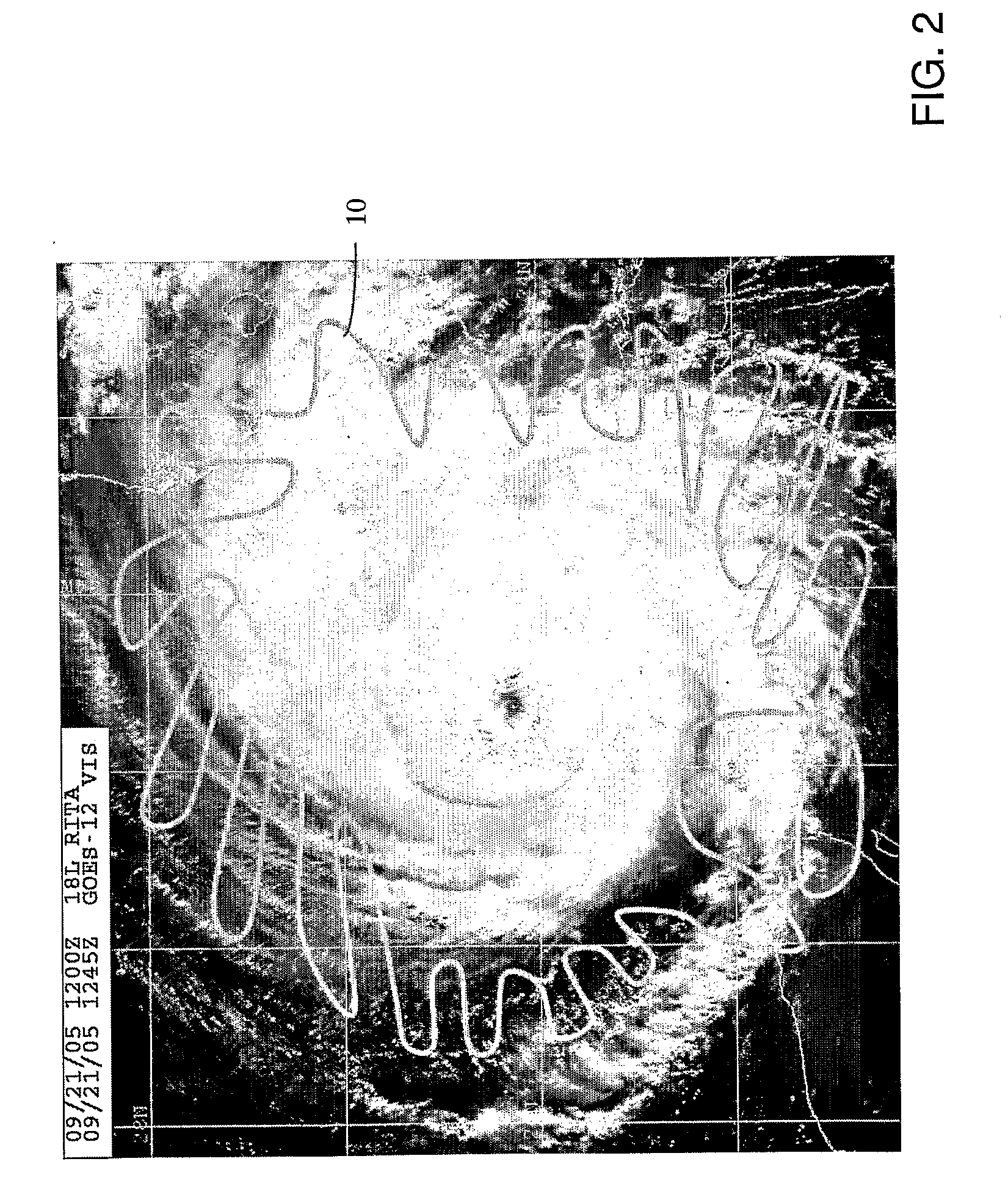 Hurricane mitigation by combined seeding with condensation and freezing nuclei