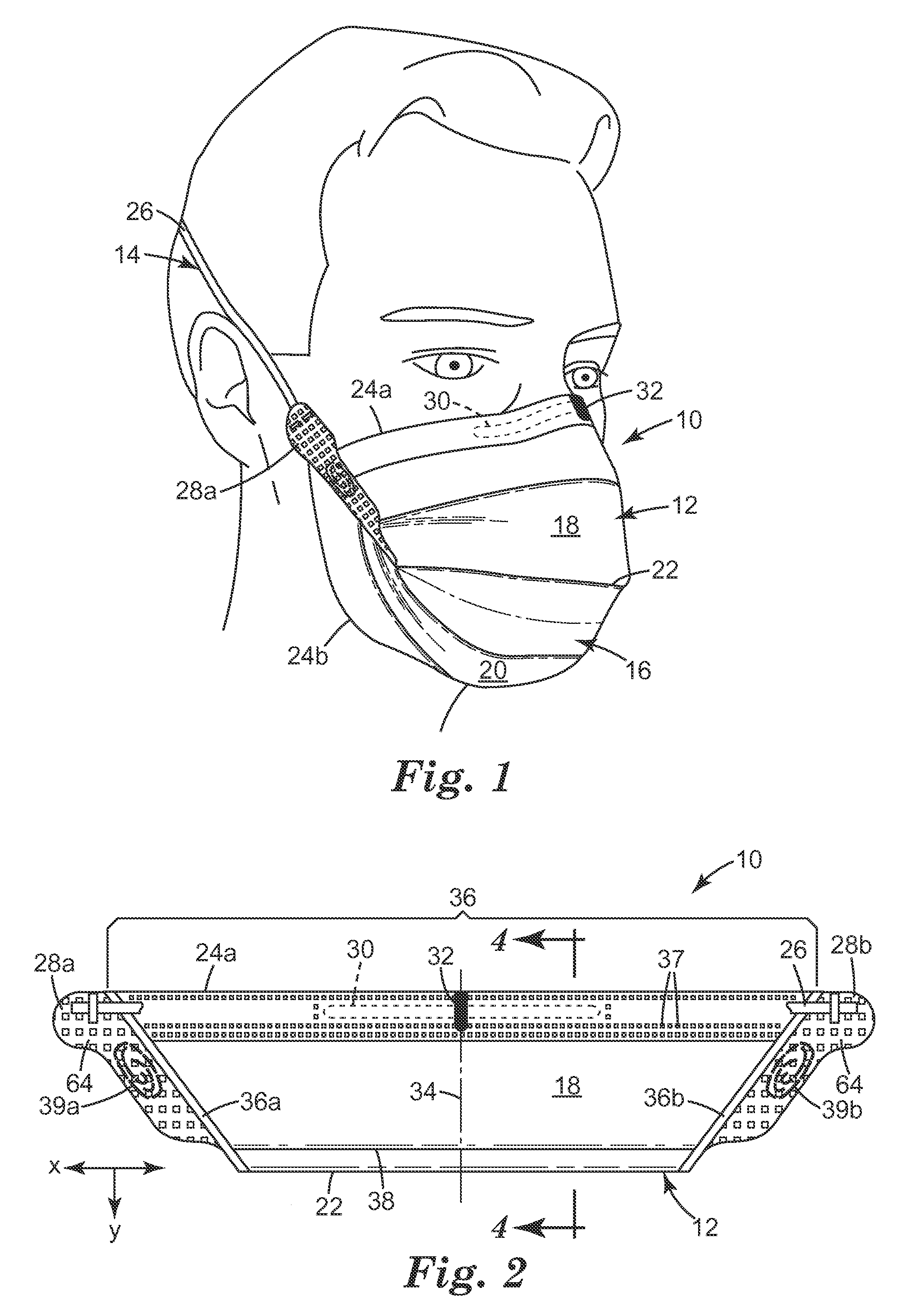 Horizontal flat-fold filtering face-piece respirator having indicia of symmetry