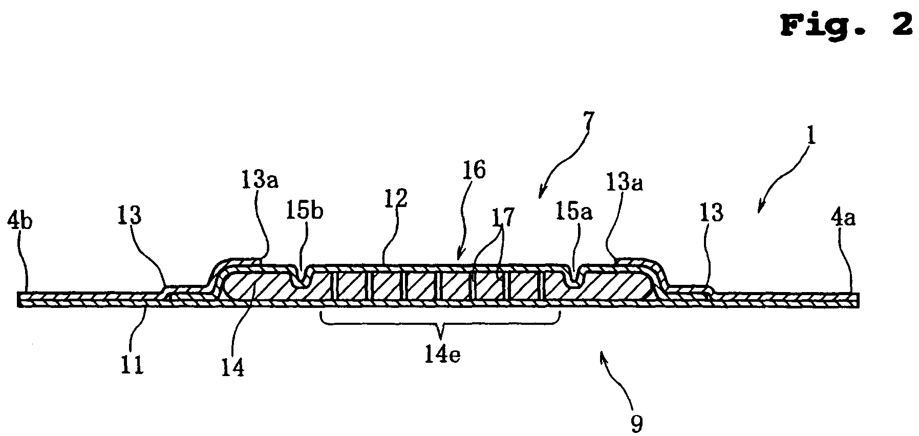 Sanitary napkin having a low stiffness region and incisions