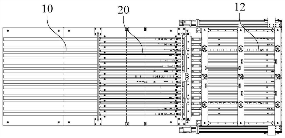 Discharging mechanism and assembling system