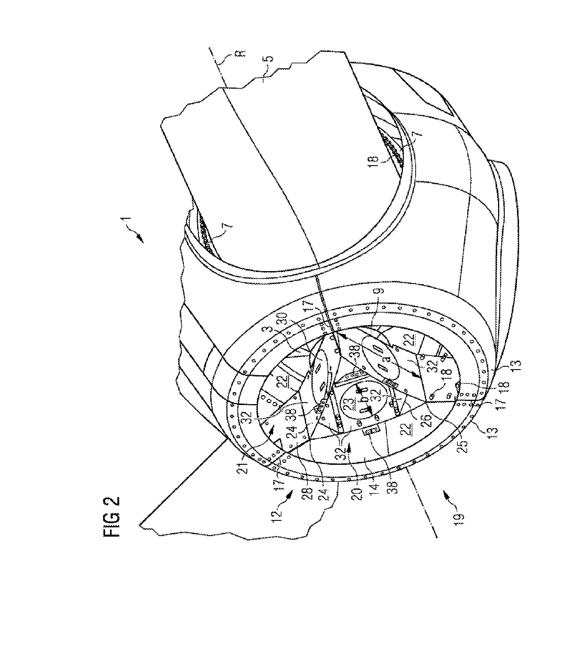 Safety device for an operator during the servicing of a hub of a wind turbine