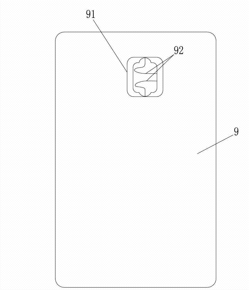 Double-interfaced card packaging method and take-up clamp thereof