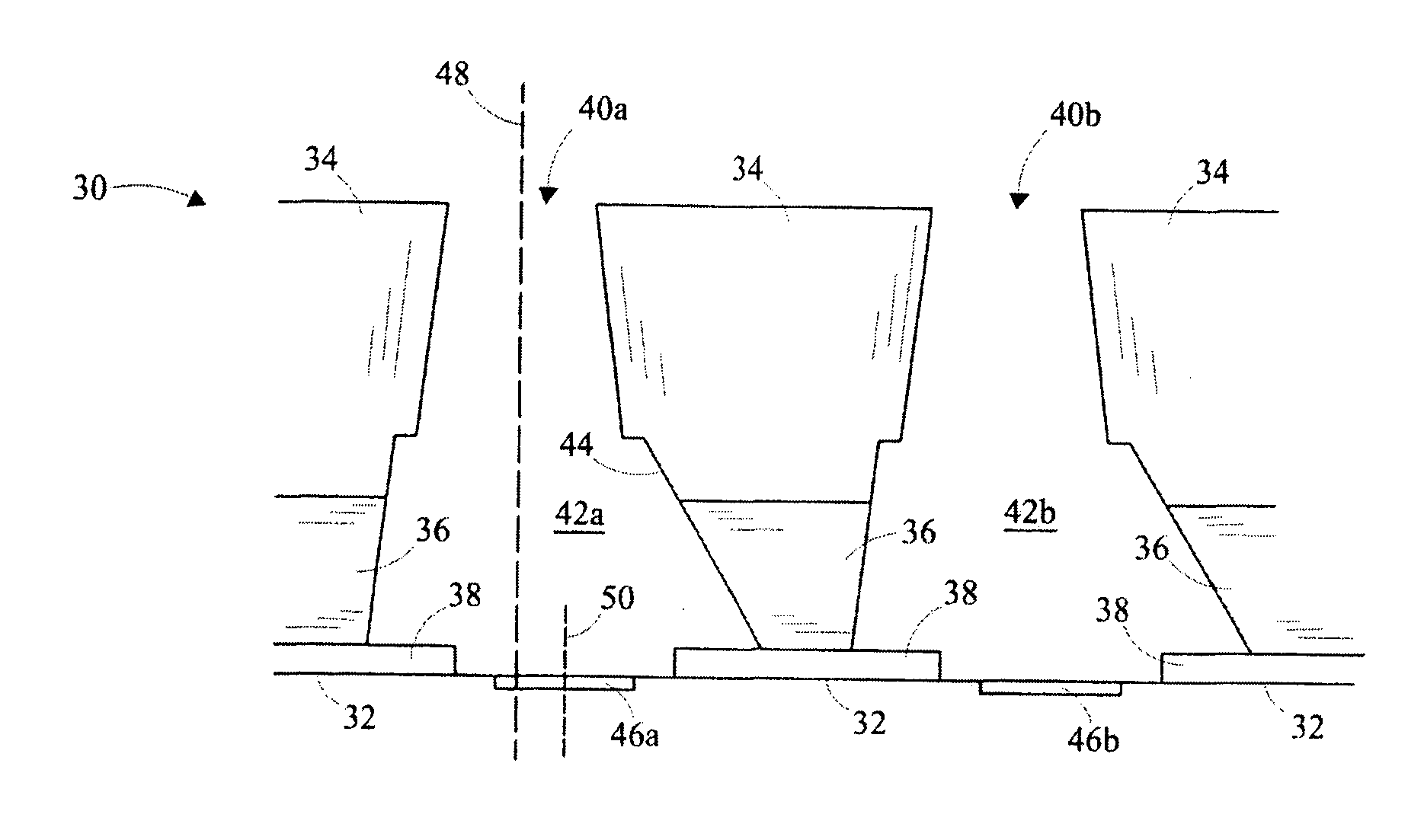 Nozzle plate for improved post-bonding symmetry