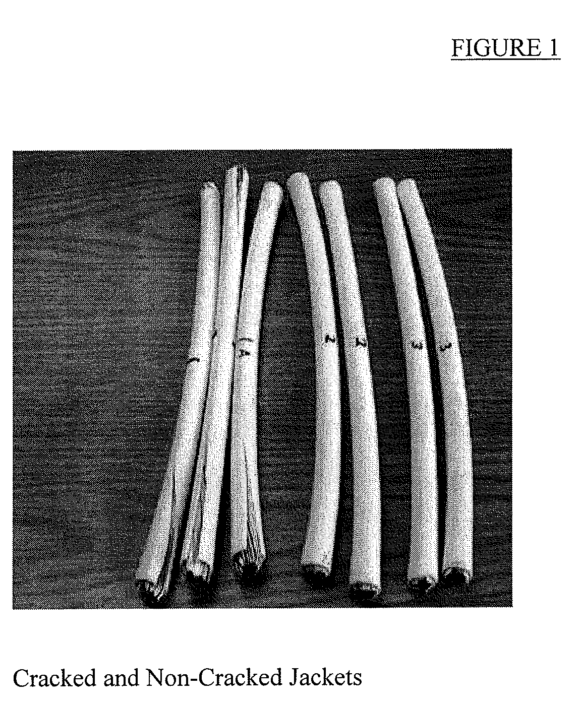 Crack-resistant, flame retardant, halogen-free, cable assembly and coating composition