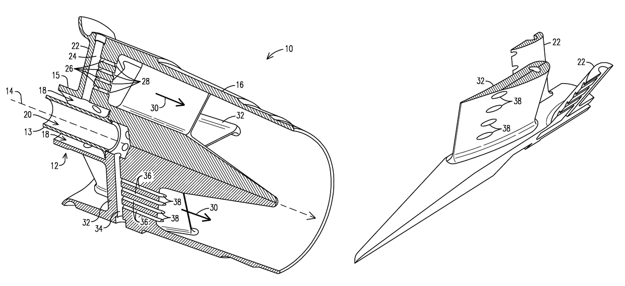 Fuel injector including tandem vanes for injecting alternate fuels in a gas turbine