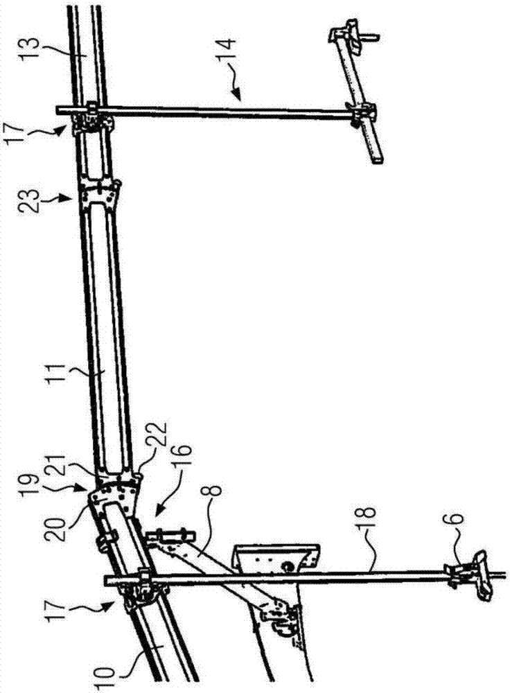 Road paver with holding device for carrying and positioning sensor unit