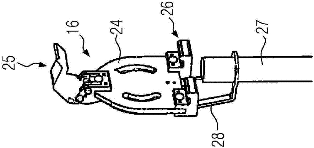 Road paver with holding device for carrying and positioning sensor unit