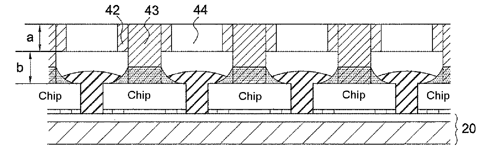 Method for positioning chips during the production of a reconstituted wafer