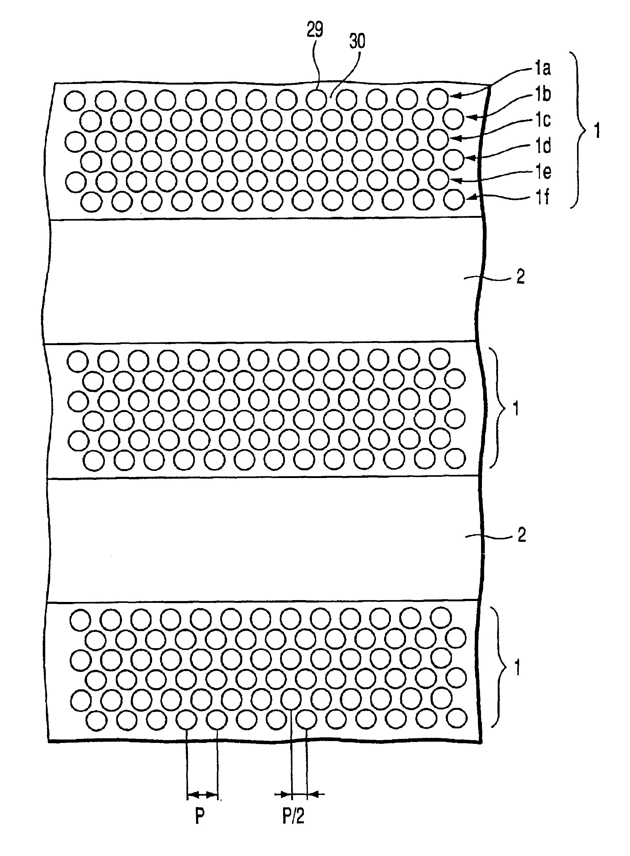 Recording medium including patterned tracks and isolation regions