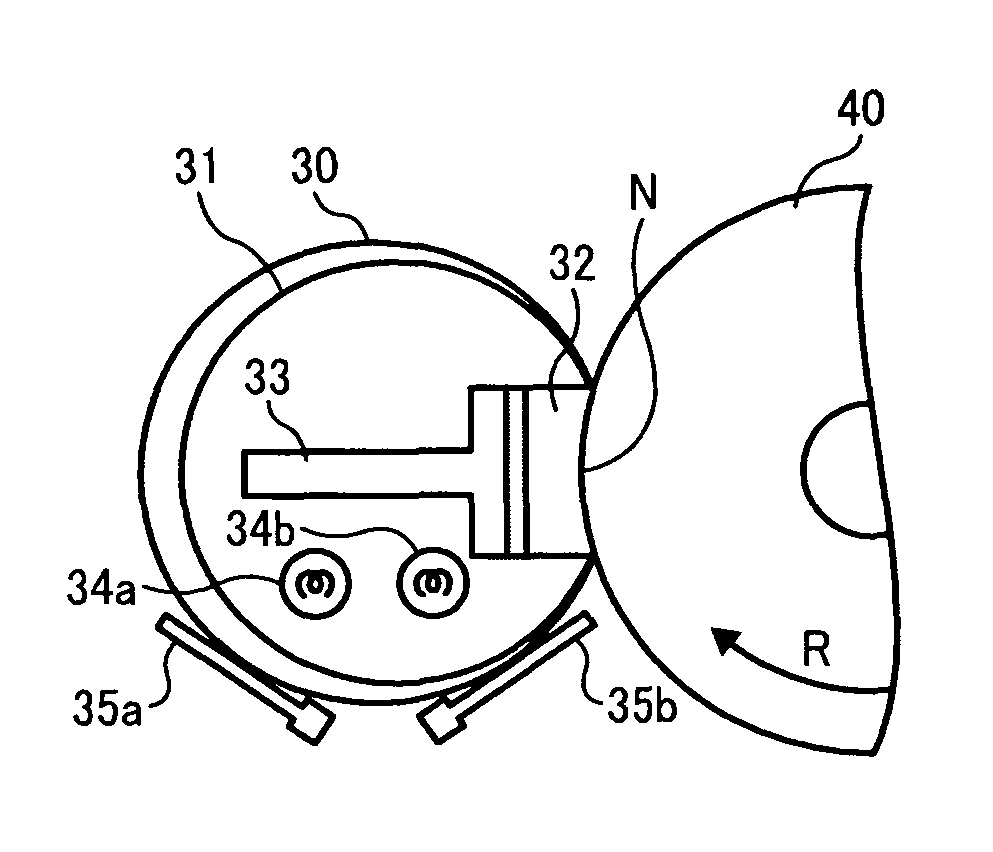 Fixing device having a plurality of heat sources and a plurality of temperature detectors and image forming apparatus including same