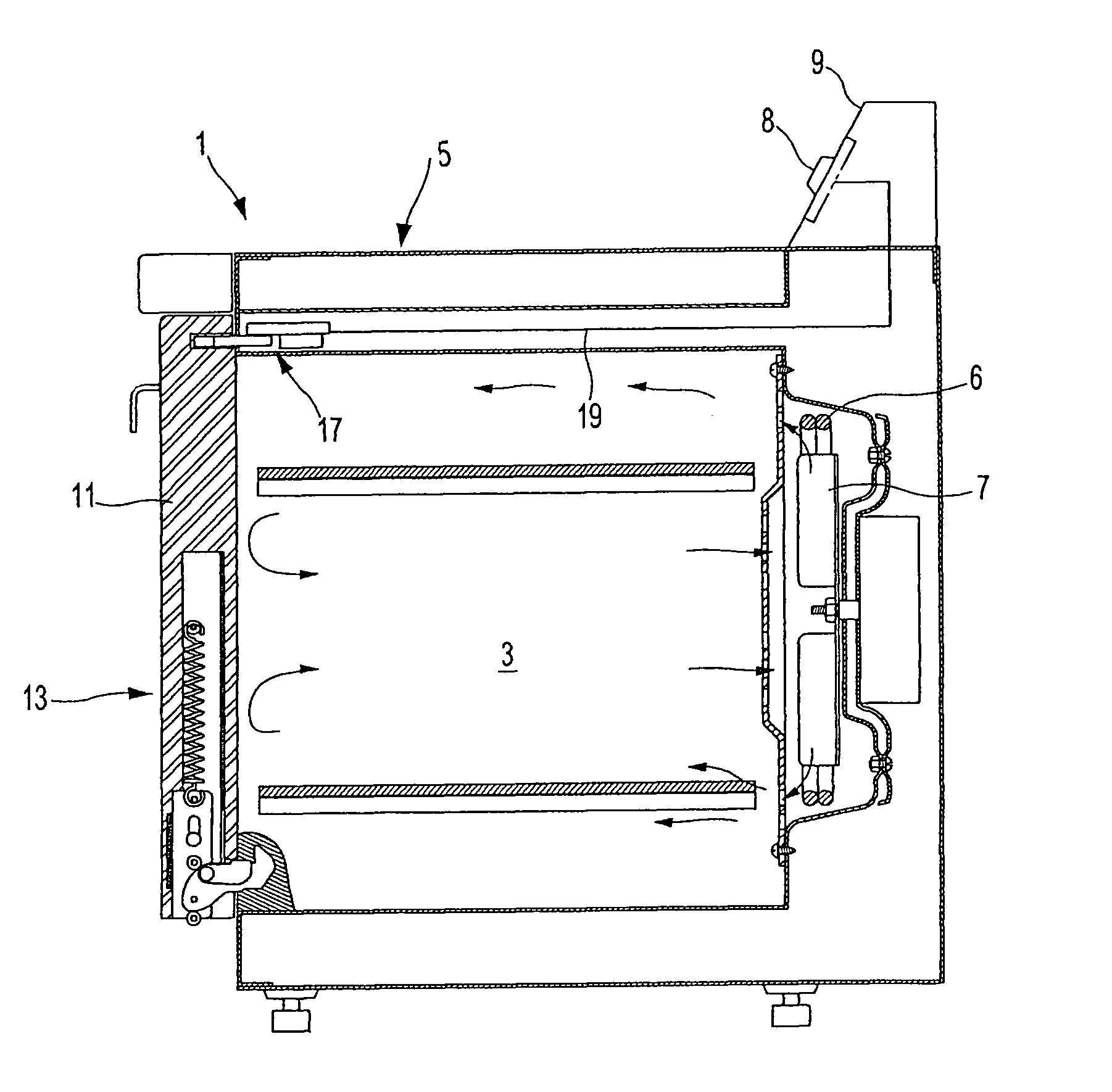 Heating cooker with hinged door