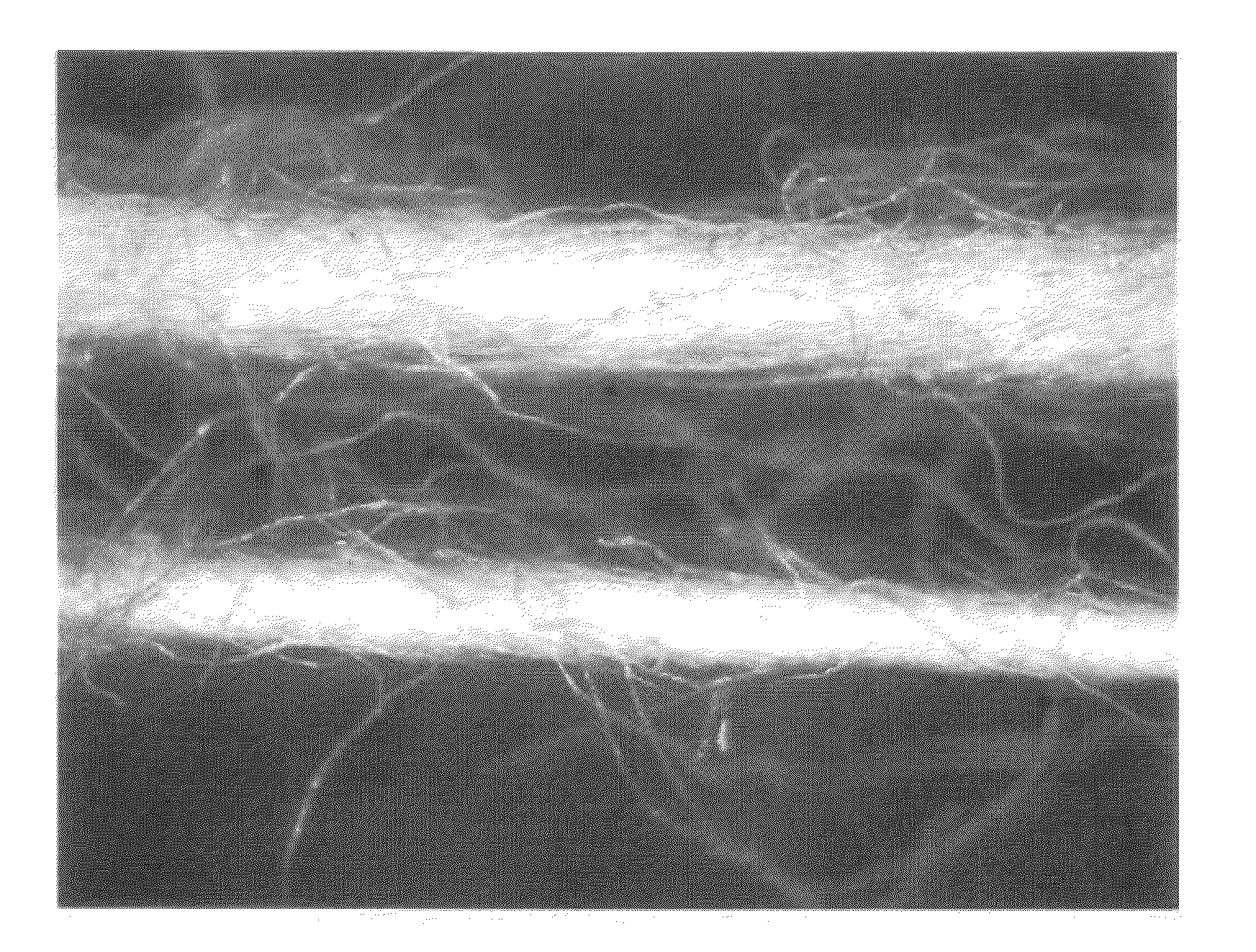 Bulked yarn and wound yarn for production of woven or knit fabric, woven or knit fabric, and method for producing the same