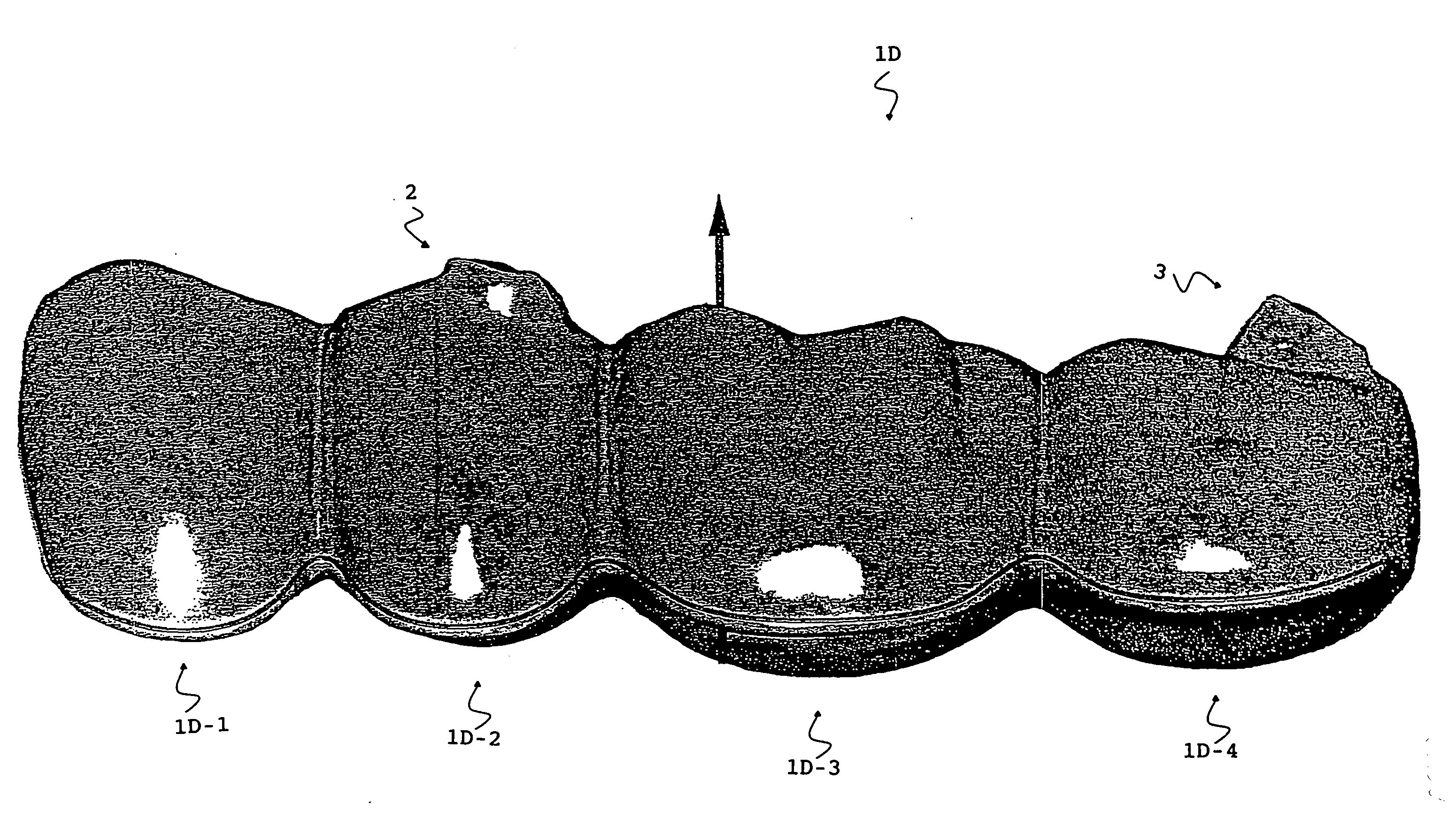 An artificial tooth, a jig for arranging the same, an arrangment method of the same and a denture