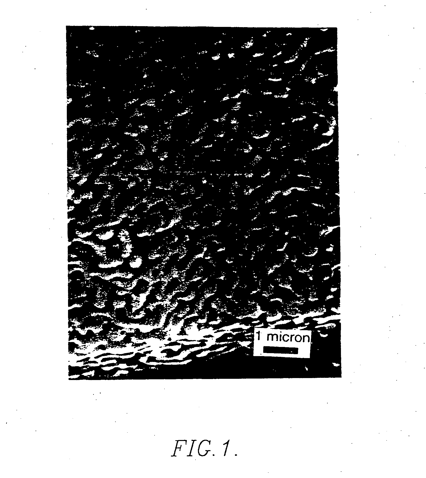 Glass composite including dispersed rare earth iron garnet nanoparticles