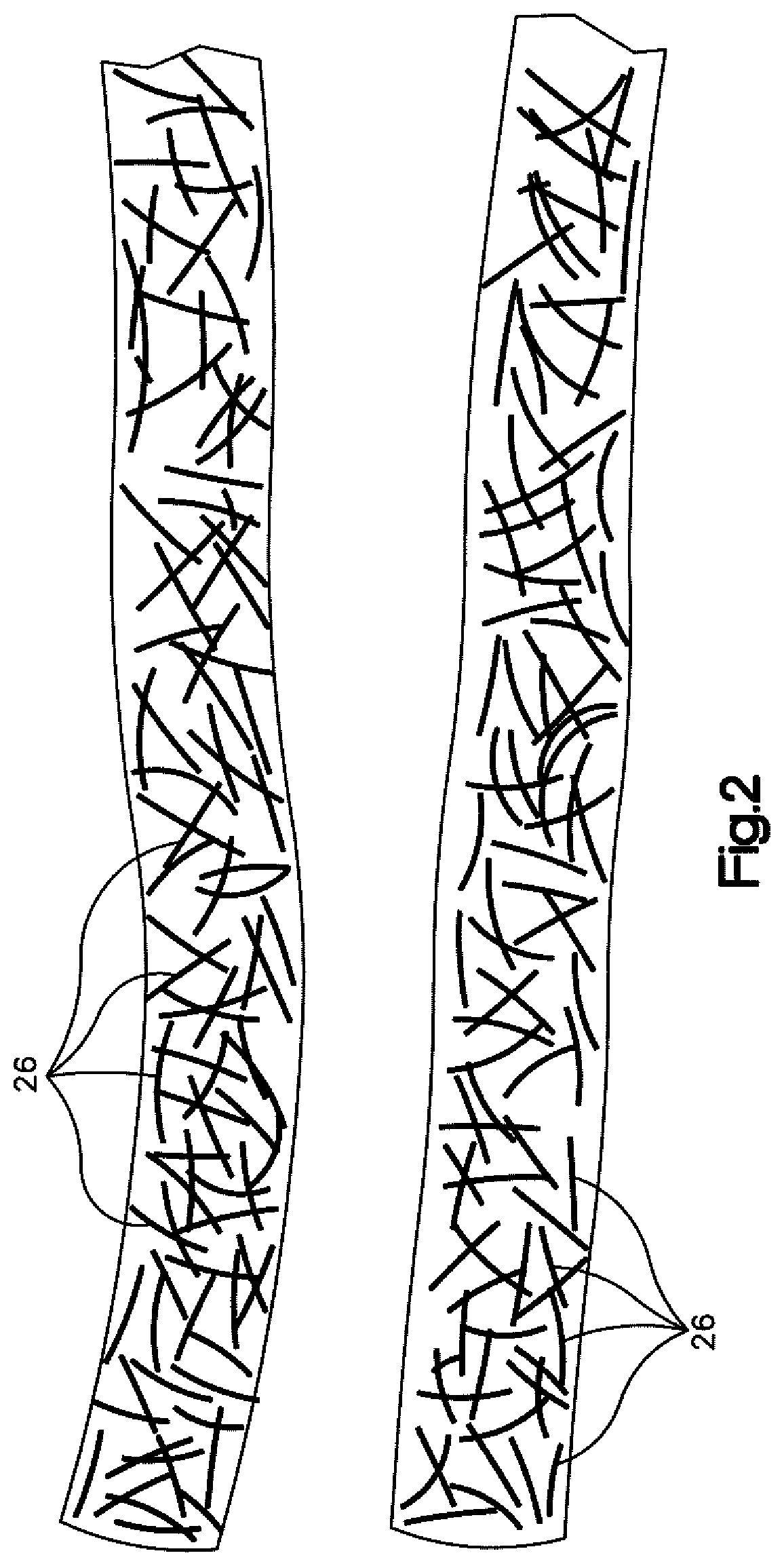 Flexible implement grip with randomly oriented cord fibers