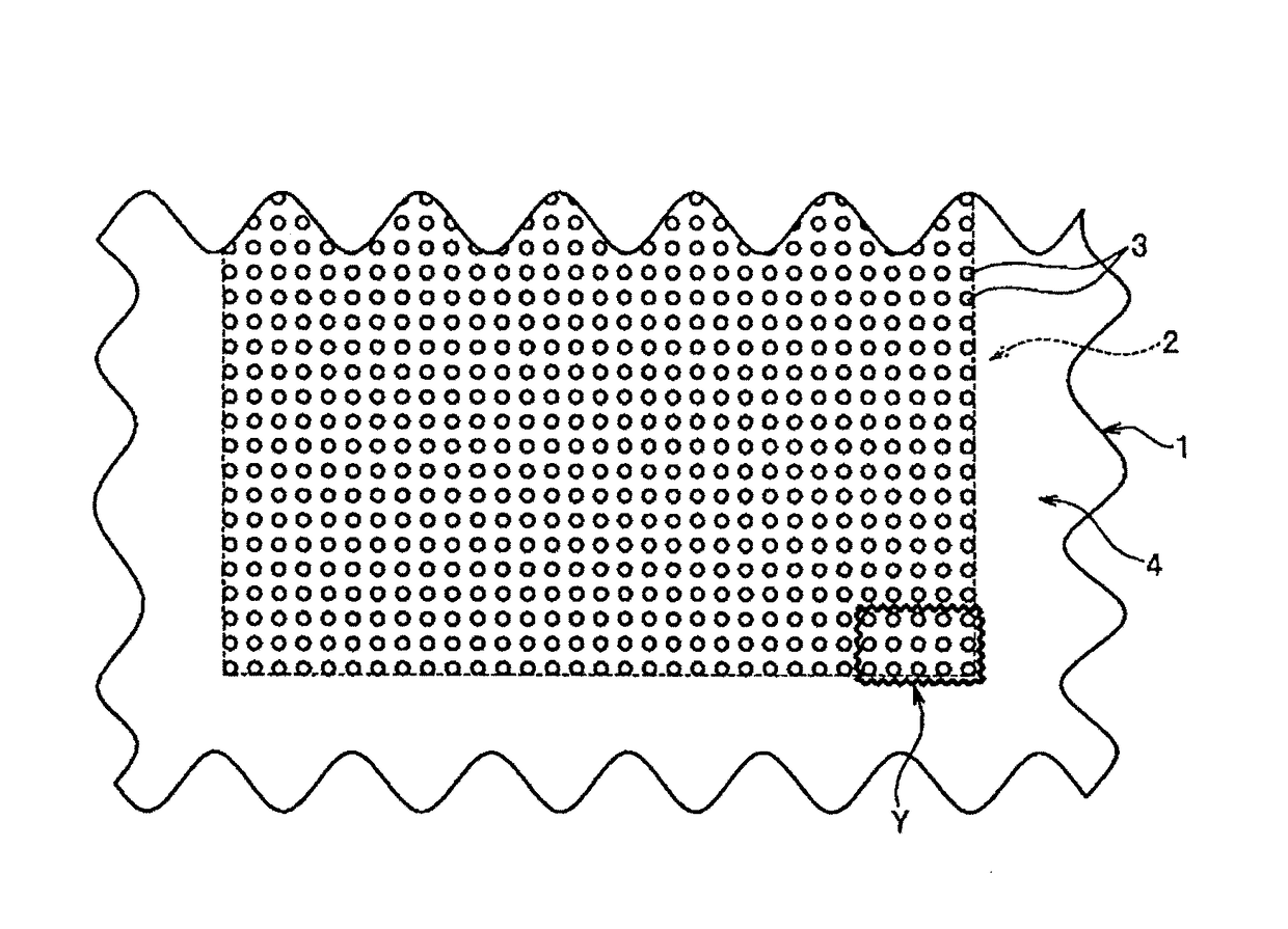 Process for producing a fibrous bundle via a spinning nozzle