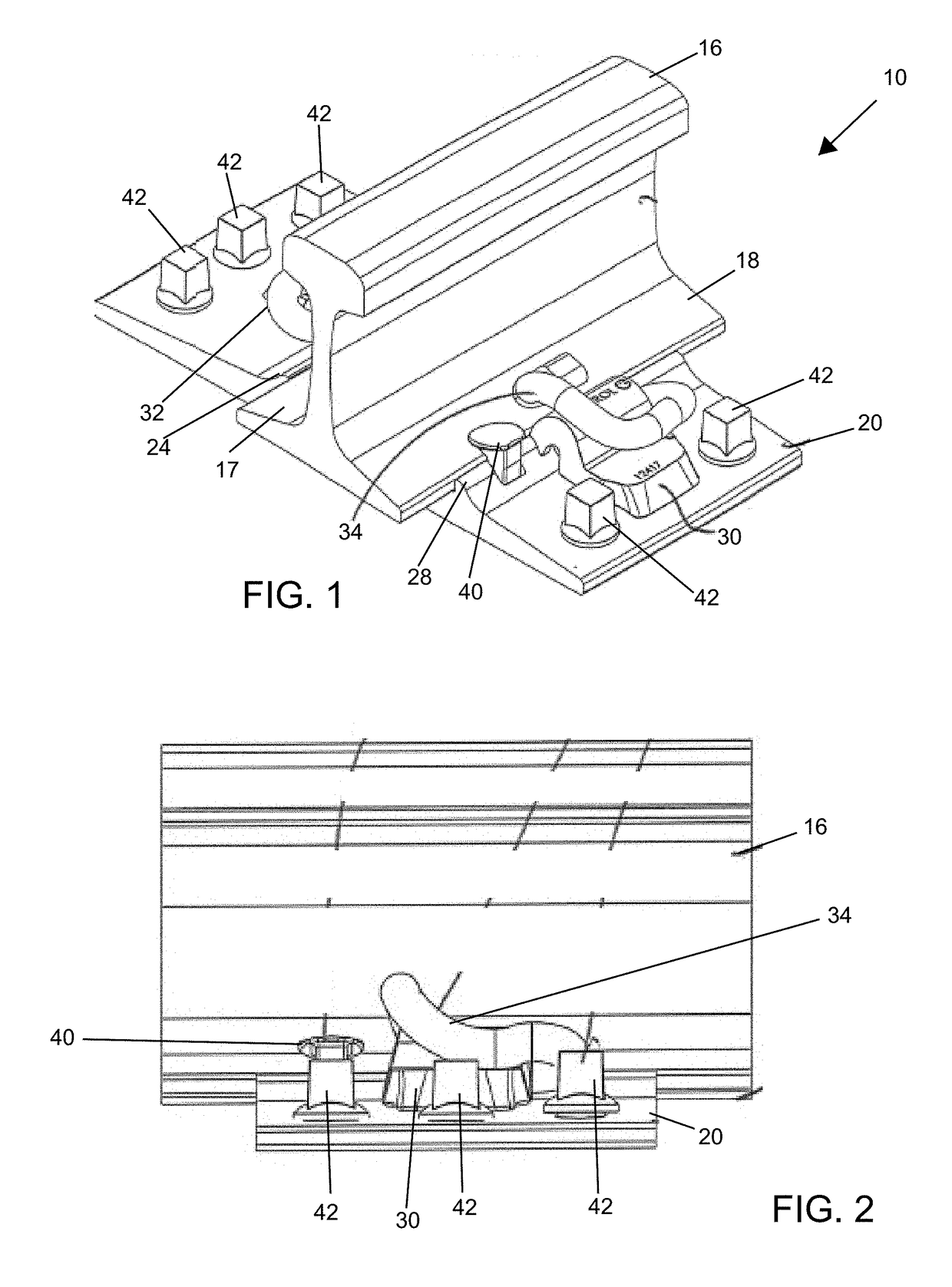 Tie plate for railroad tracks with spike protectors